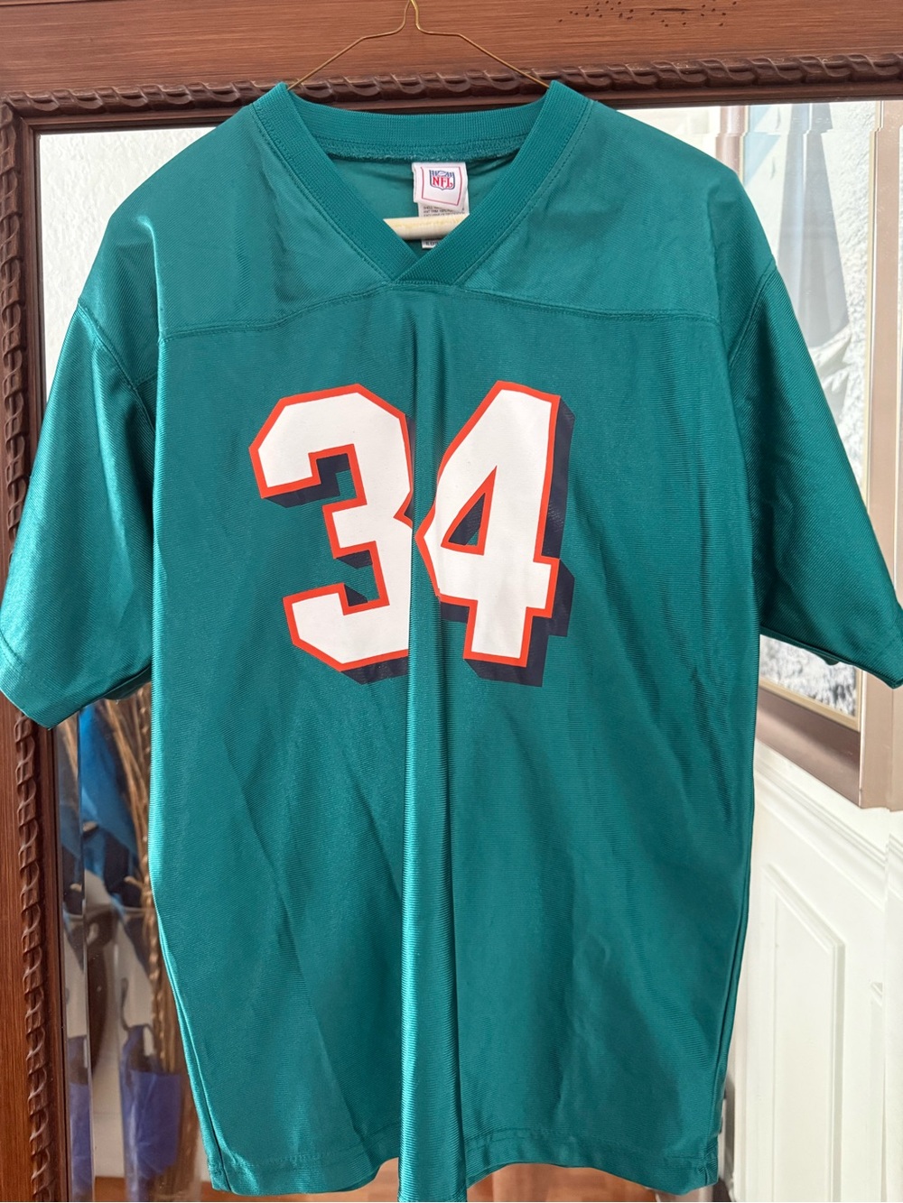 NFL Kids Teal Football Jersey #34 with White and Orange Accents